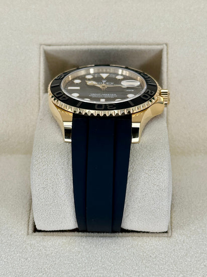 Relógio Rolex com mostrador azul escuro e pulseira preta, caixa dourada
