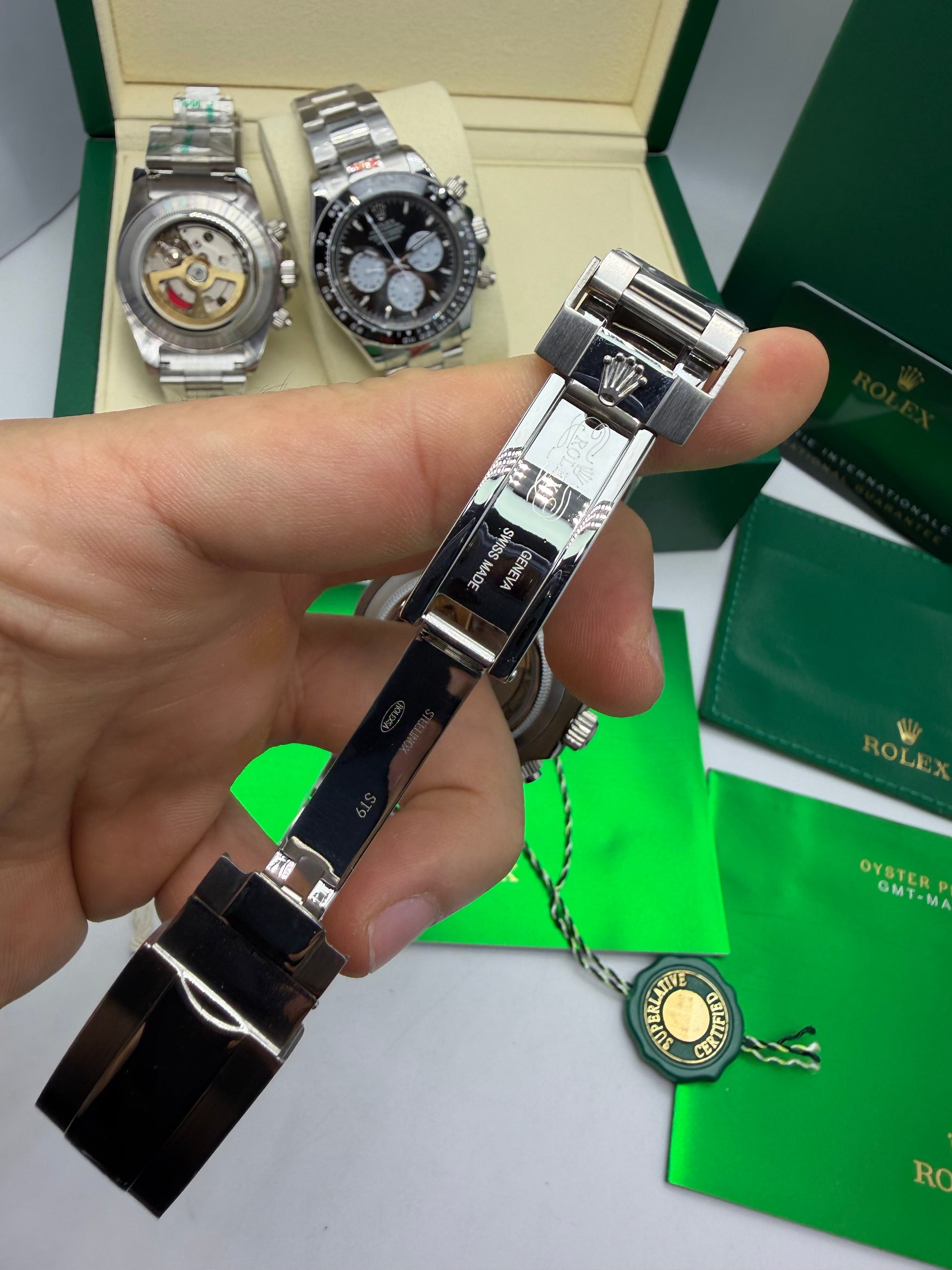Relógio Daytona automático com fecho aberto e pulseira preta, caixa em aço