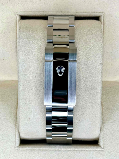 Pulseira de aço do relógio Rolex com fecho, exibida em estojo