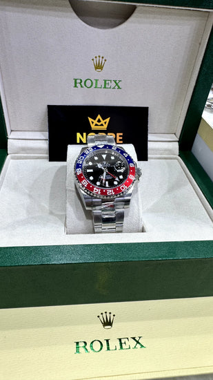 Relógio Rolex com mostrador preto e bezel Pepsi azul/vermelho, pulseira de aço