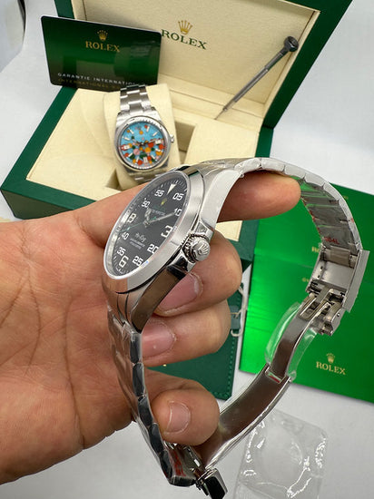 Relógio Rolex Air-King prateado com mostrador colorido e pulseira de aço